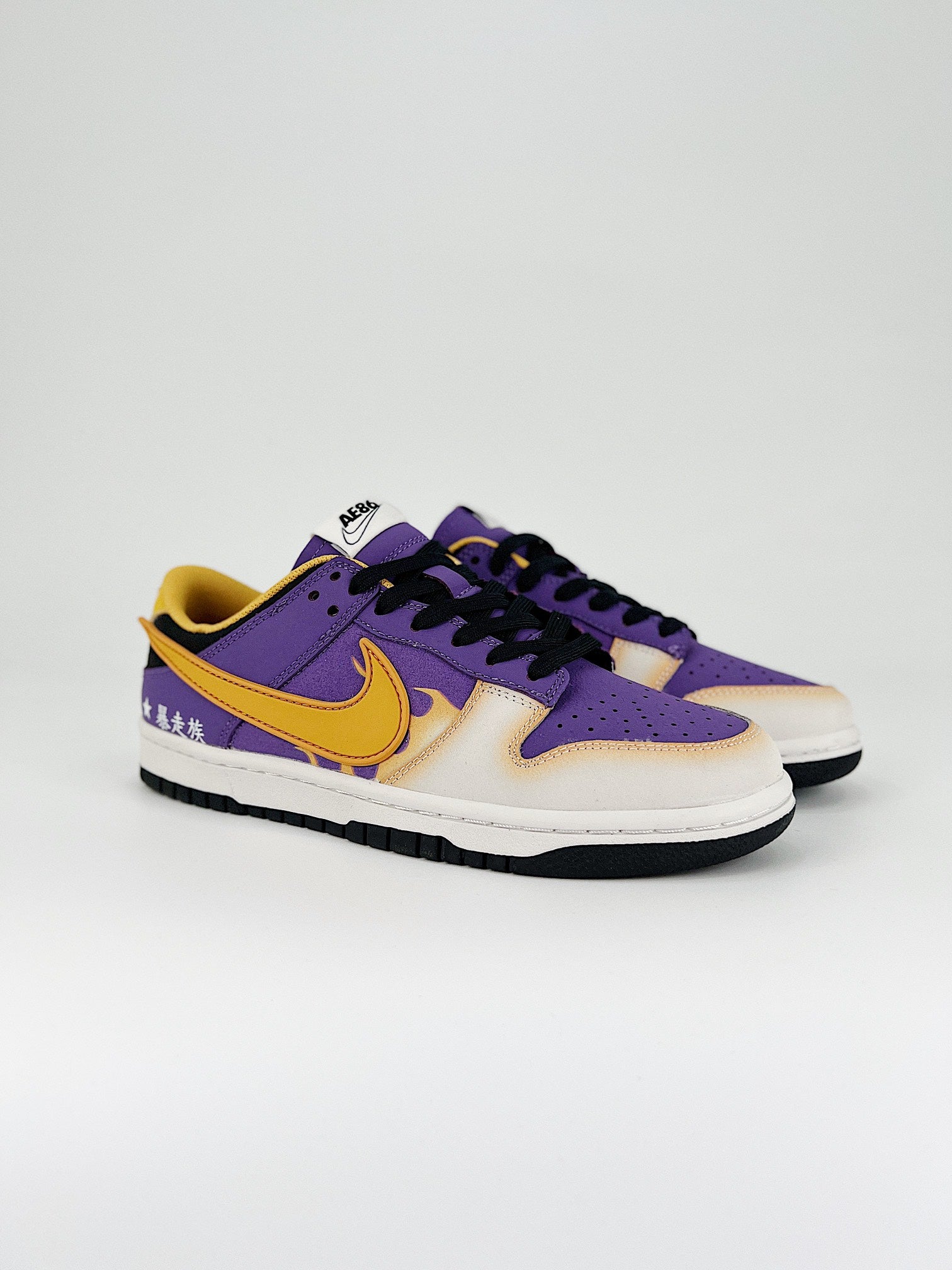 NIKE DUNK LOW RETRO SB 
" Purple yellow   "