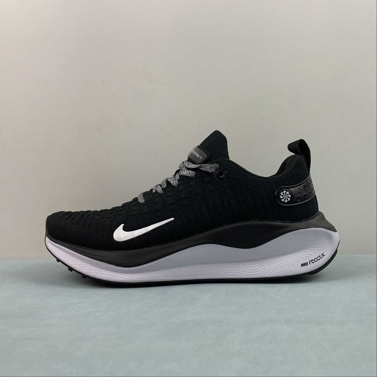 Nike react infinity black and white shoes