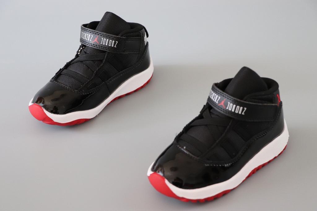 Joe 11 chaussures montantes noires et rouges
