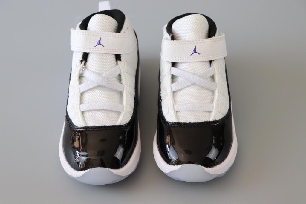 Joe 11 chaussures montantes blanches et noires
