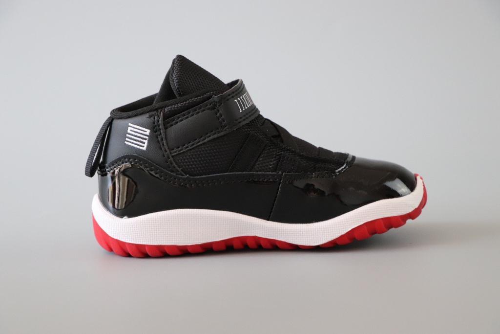 Joe 11 chaussures montantes noires et rouges