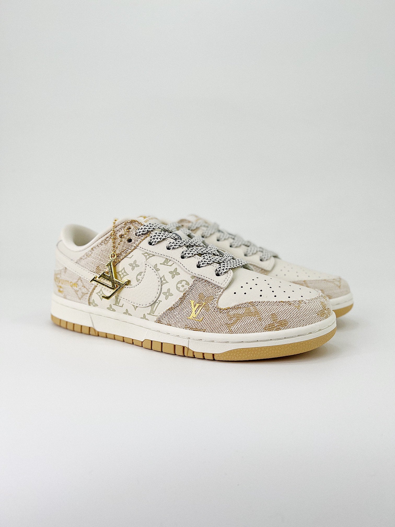 NIKE DUNK LOW RETRO SB & LV
" Beige gold"