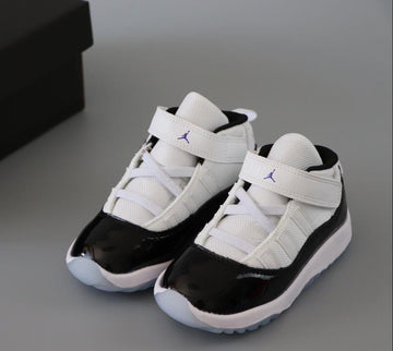 Joe 11 chaussures montantes blanches et noires