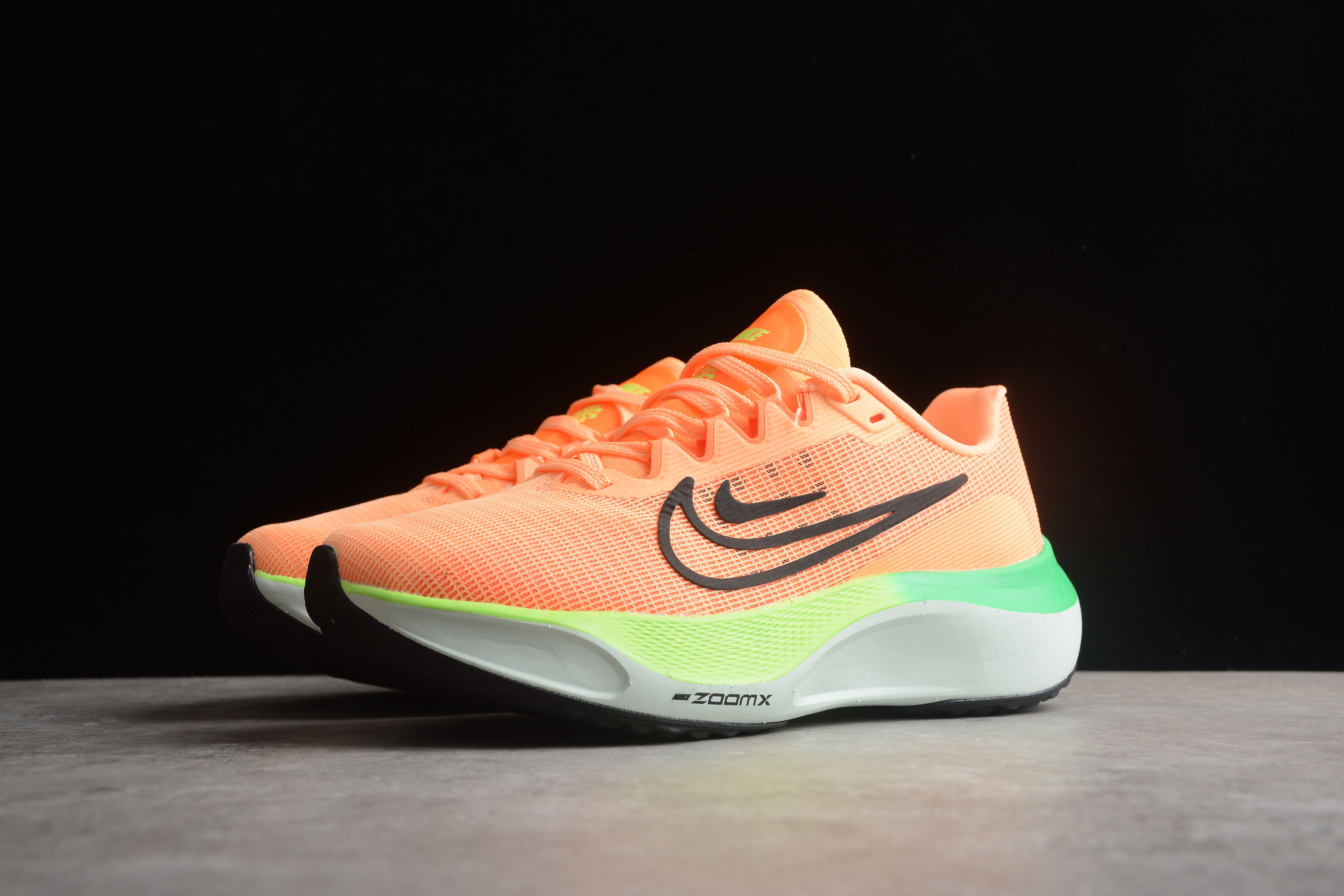 NK zoom Fly 5 orange and green