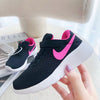 Nike running black and pink shoes