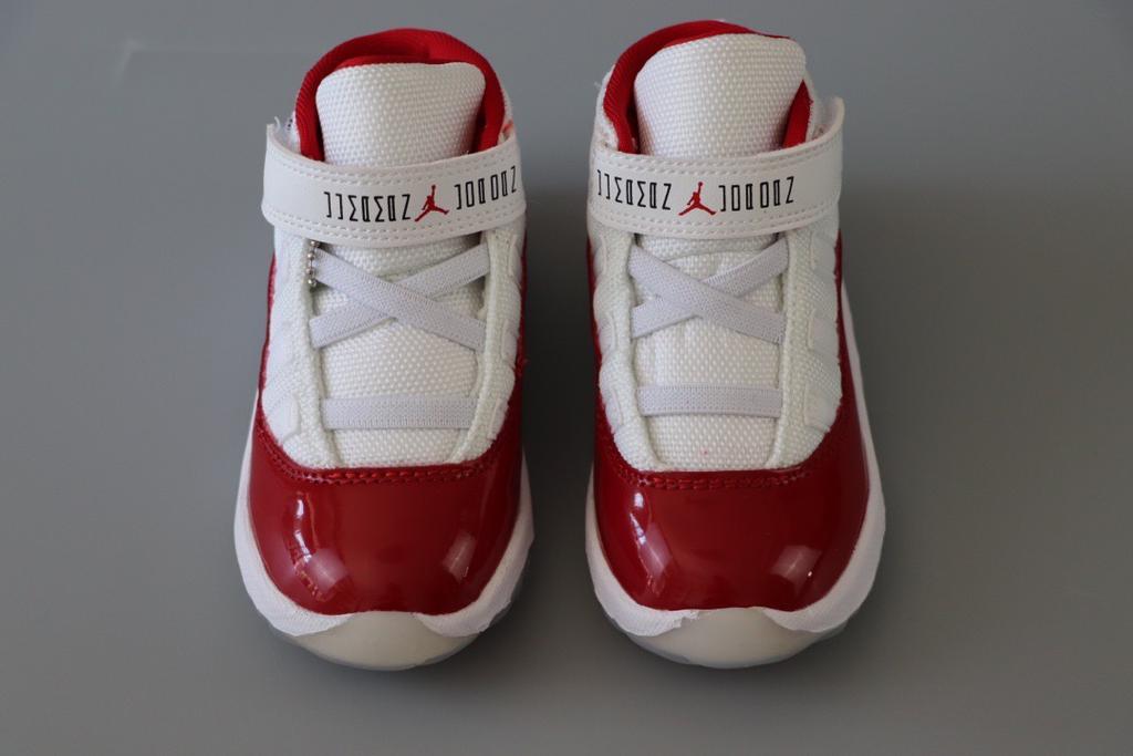 Joe 11 chaussures montantes blanches et rouges