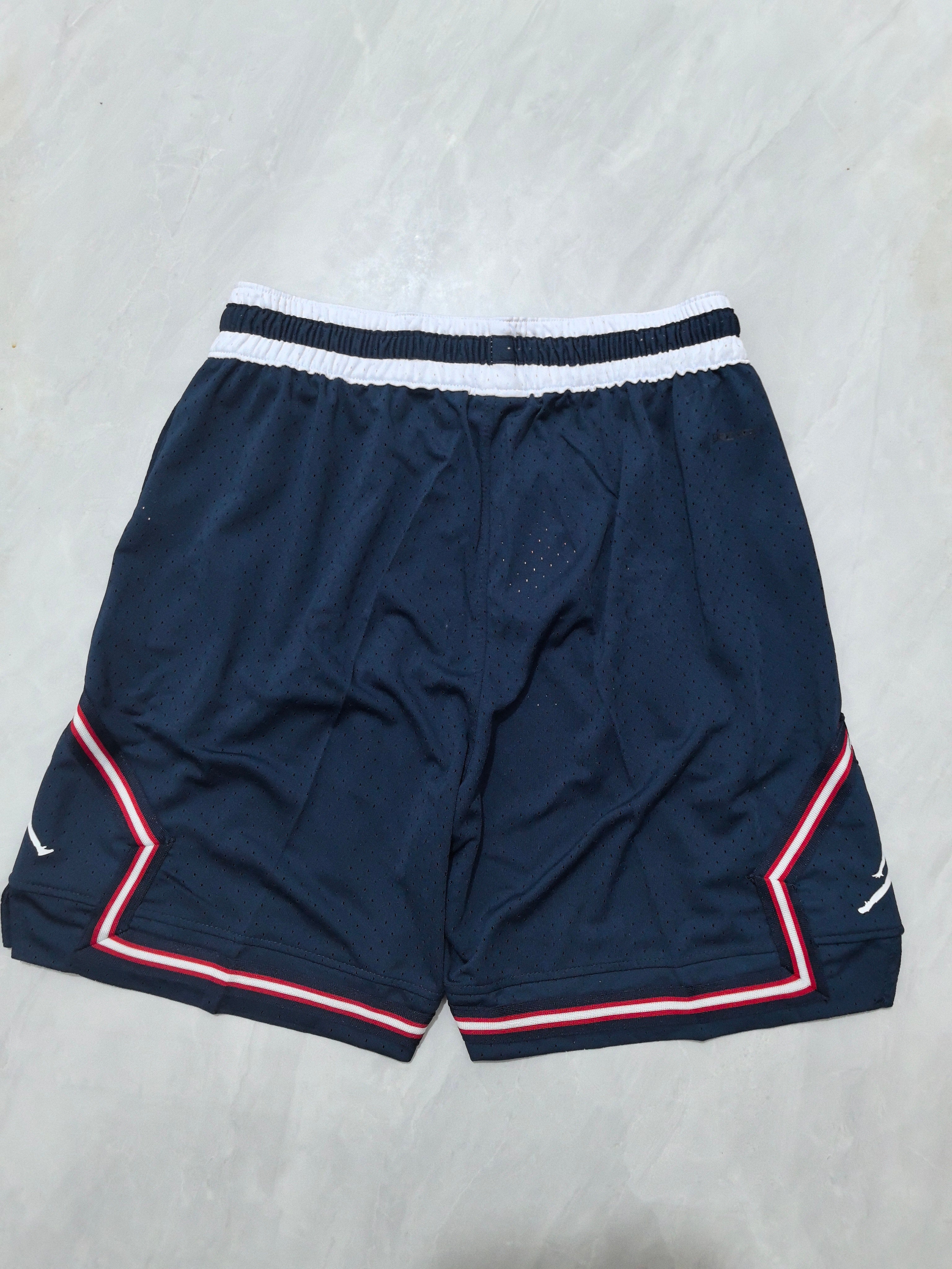 Jordan A-22 blue, white and red striped basketball shorts