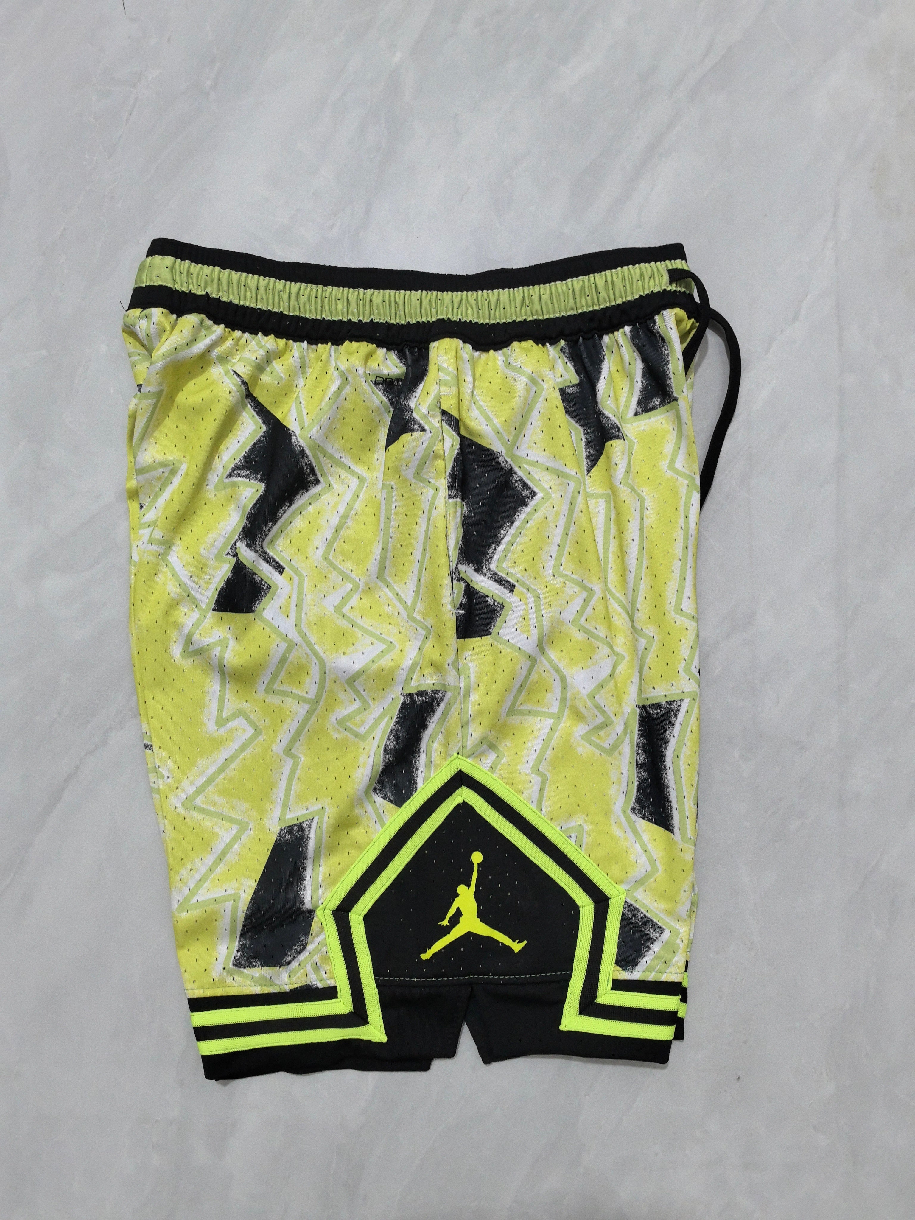 Jordan B-27 tie-dye black, yellow, and light green