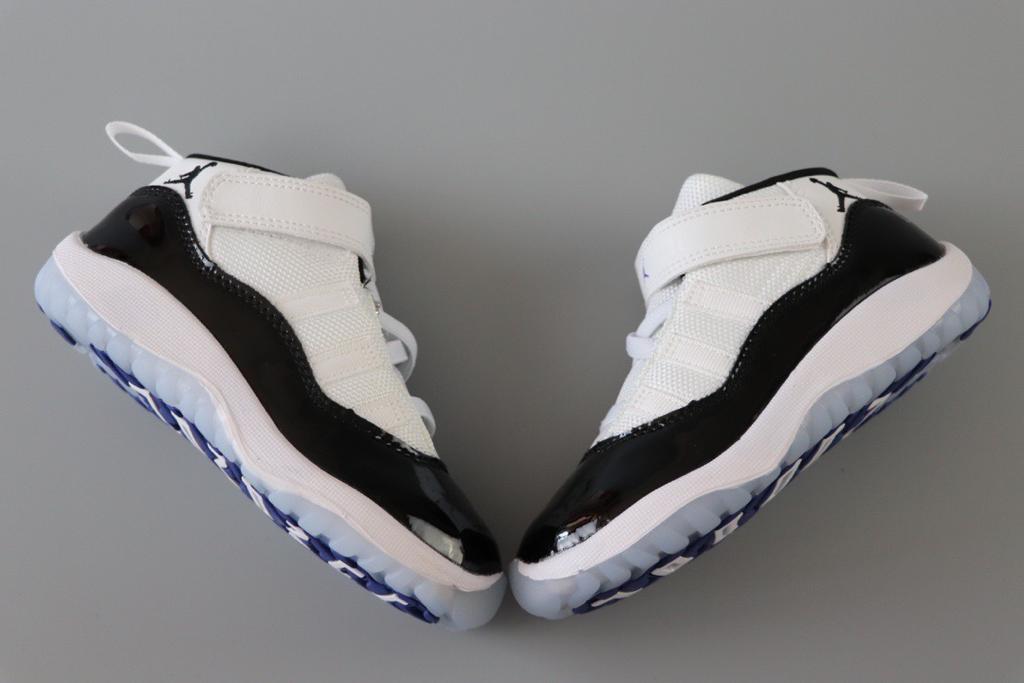 Joe 11 chaussures montantes blanches et noires