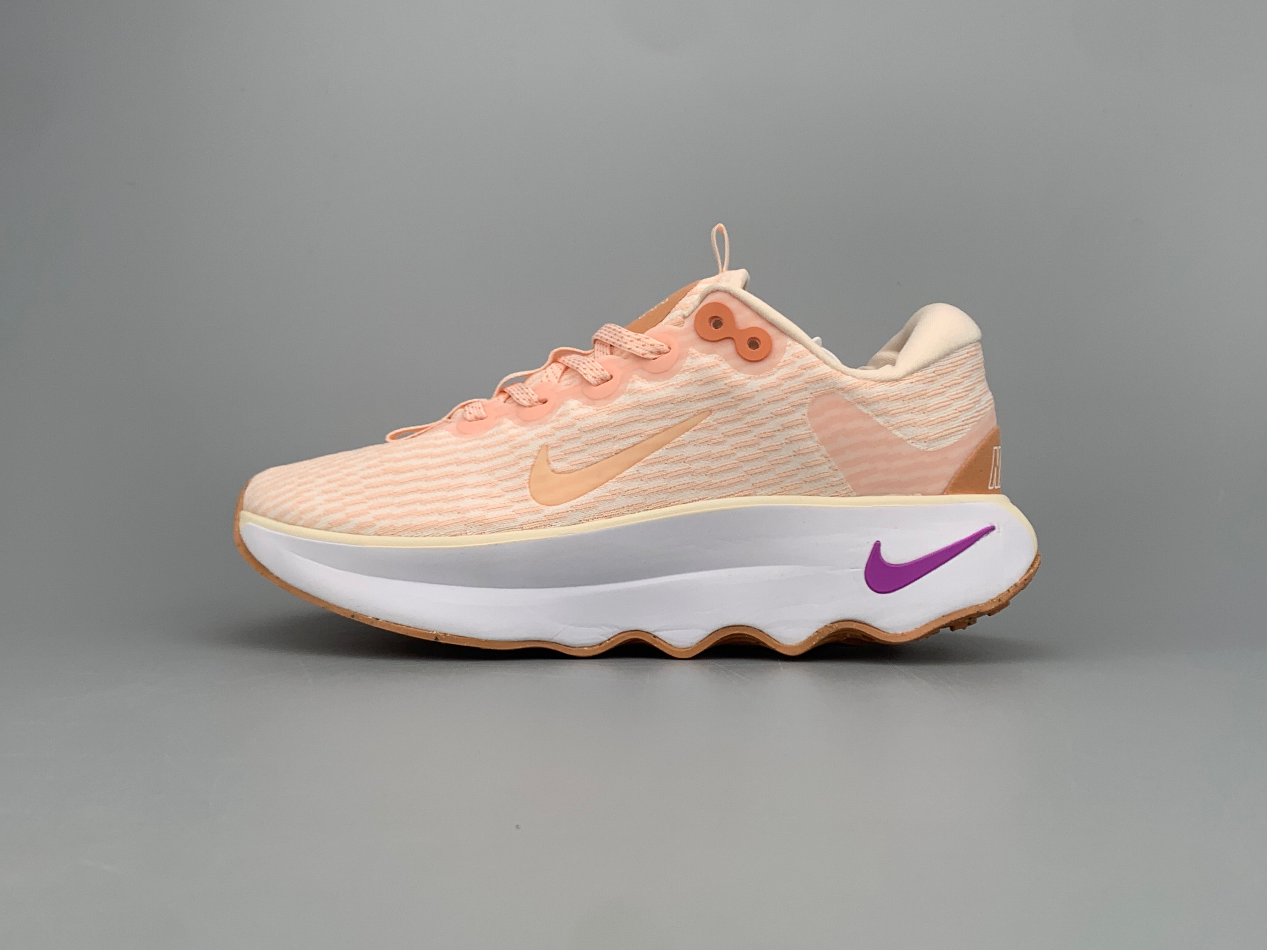 Nike motivia light pink shoes