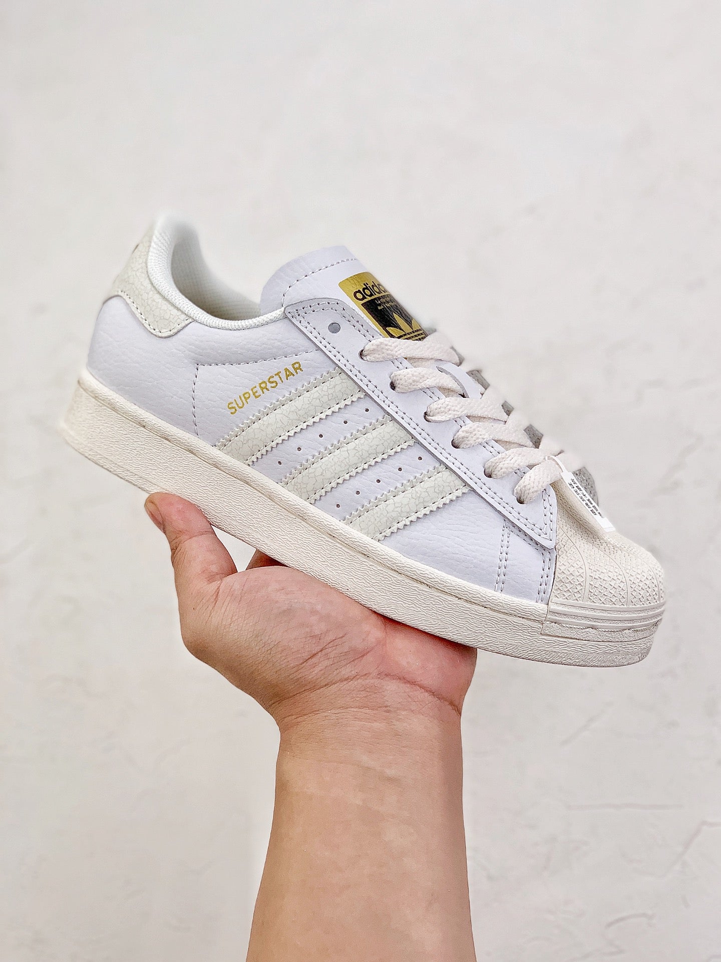 Adidas superstar white and gold