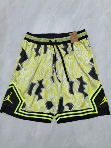 Jordan B-27 tie-dye black, yellow, and light green
