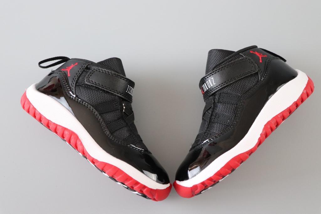 Joe 11 chaussures montantes noires et rouges