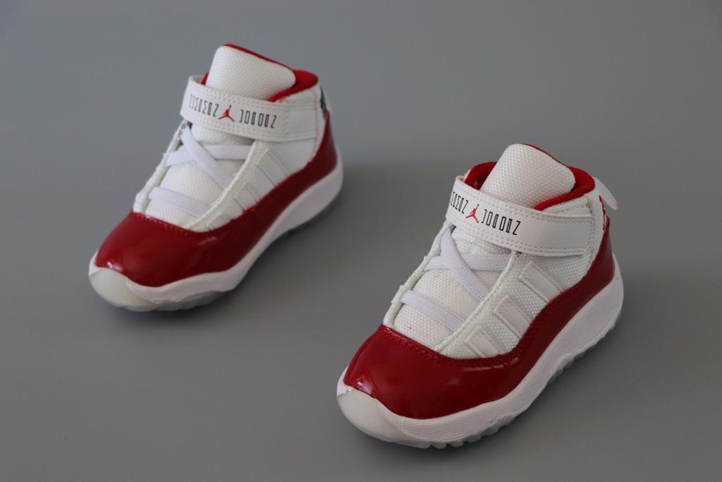 Joe 11 chaussures montantes blanches et rouges