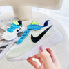 Nike running mint green and blue shoes