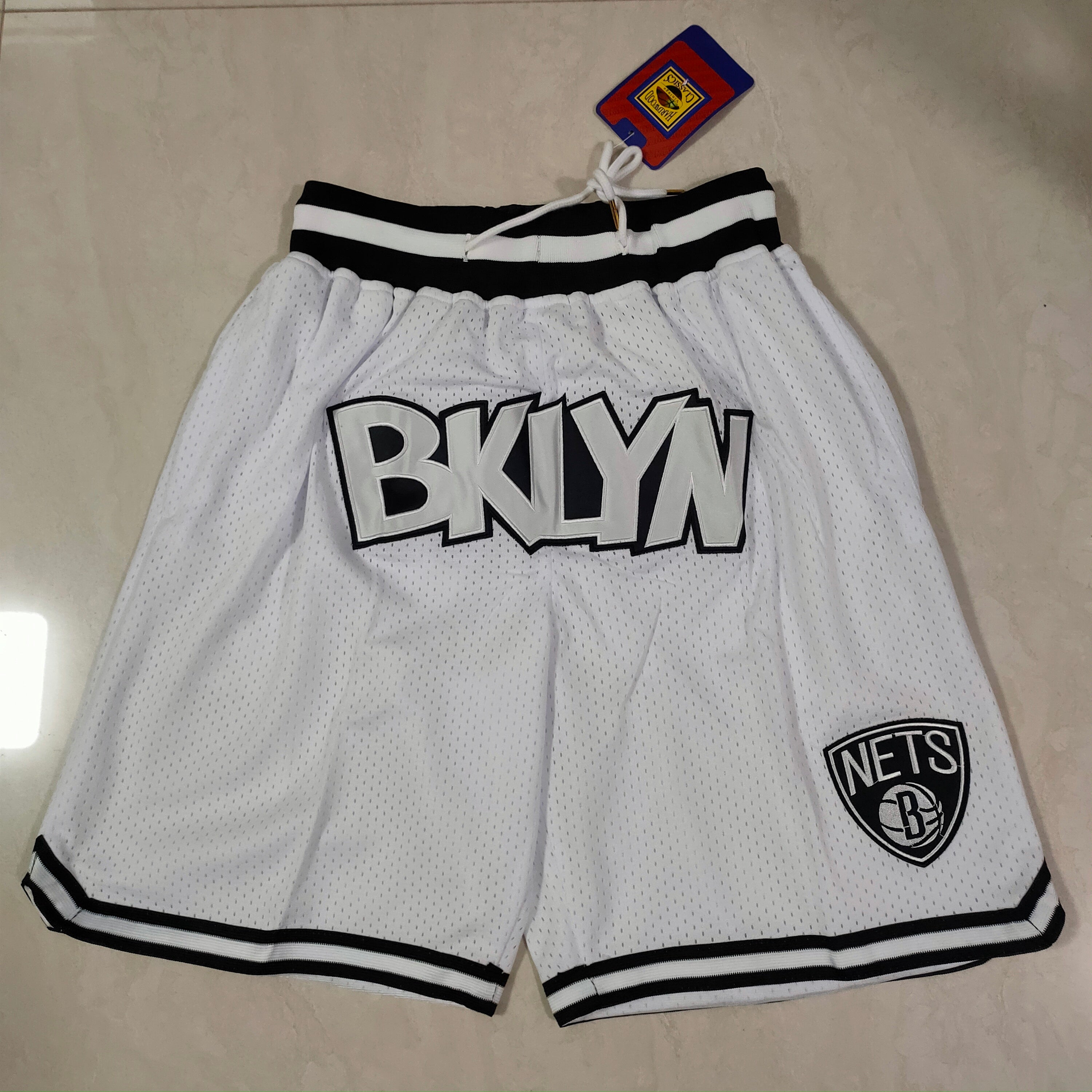 Brklyn nets black and white shorts