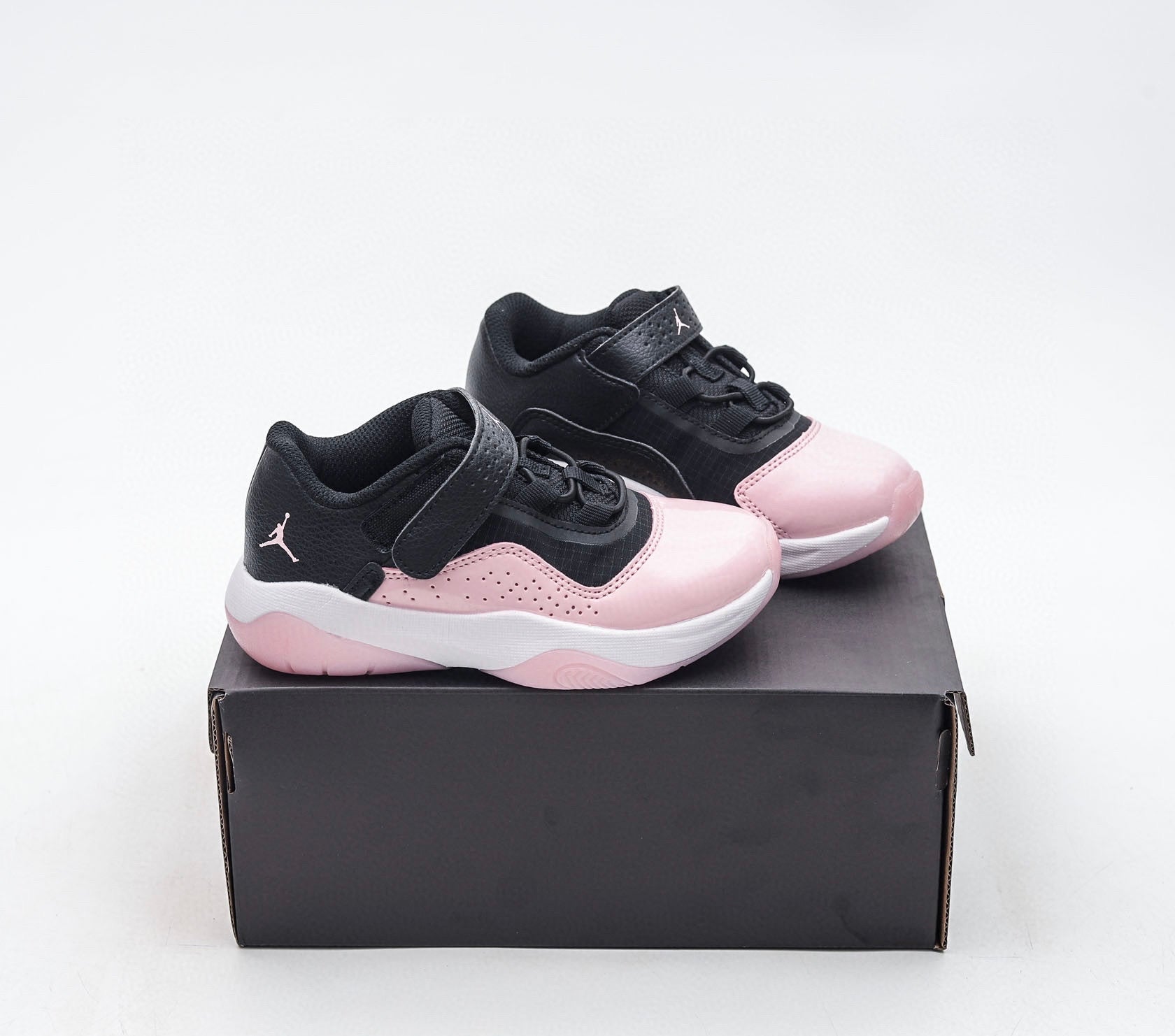 Nike air jordan retro low cut black and pink shoes
