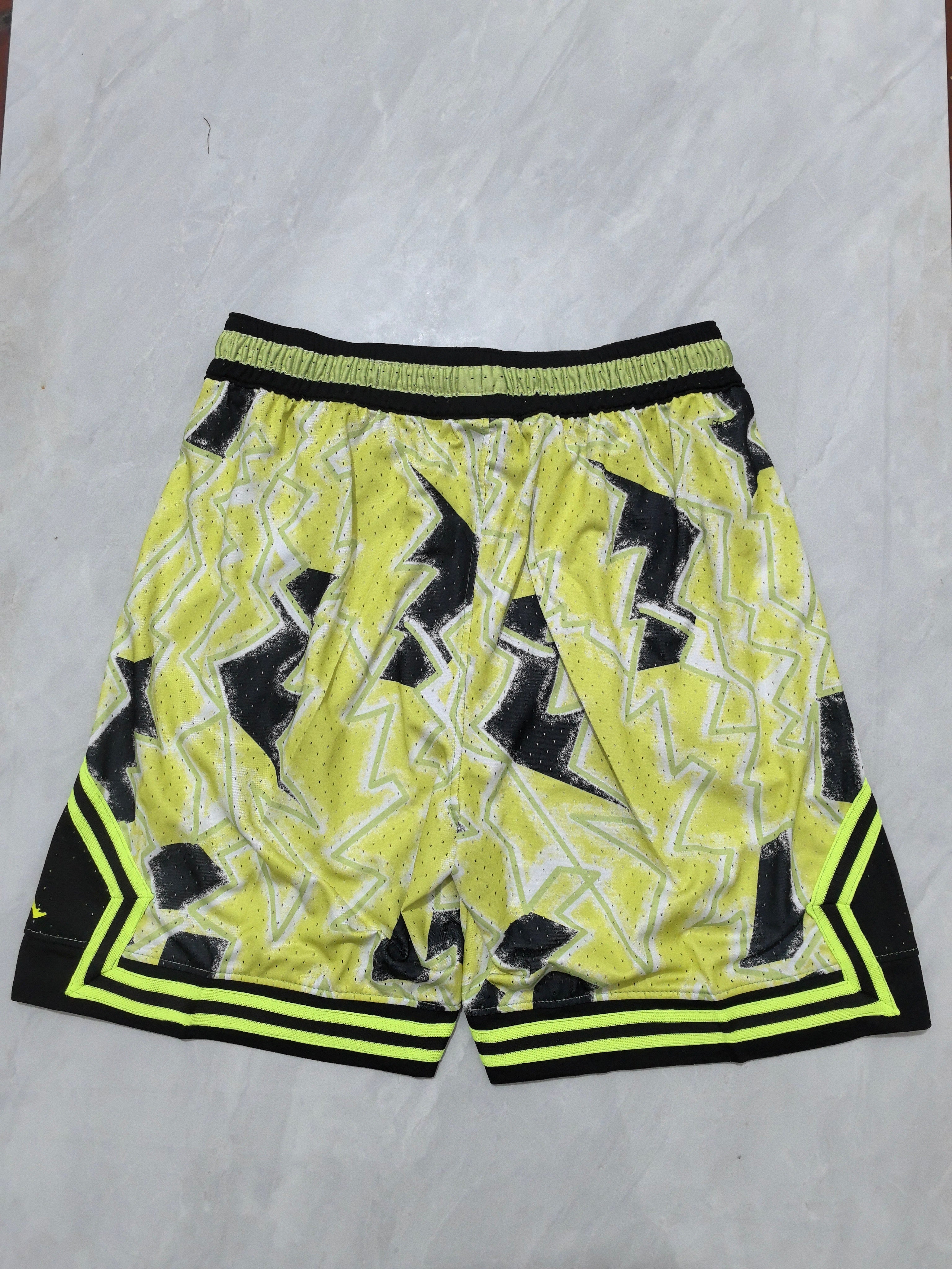 Jordan B-27 tie-dye black, yellow, and light green