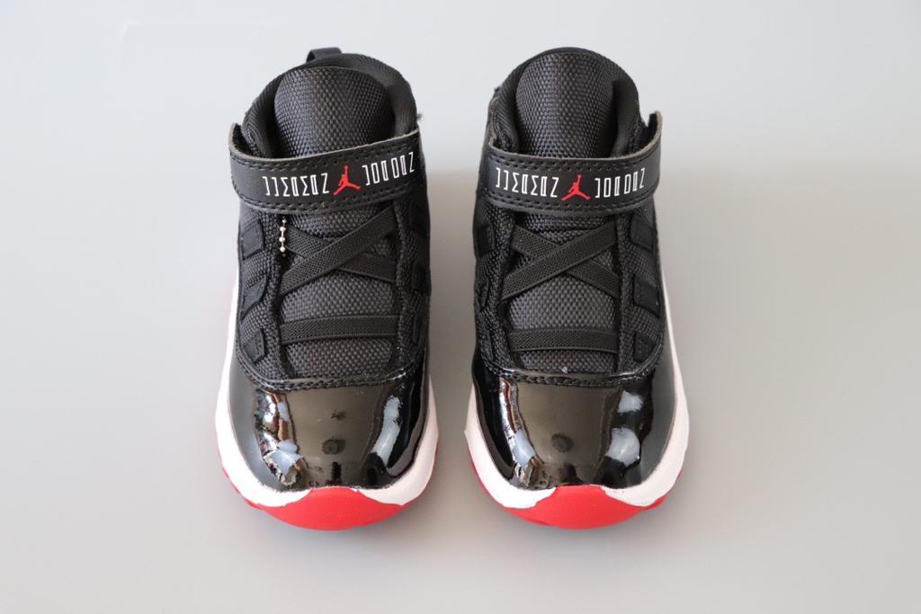Joe 11 chaussures montantes noires et rouges