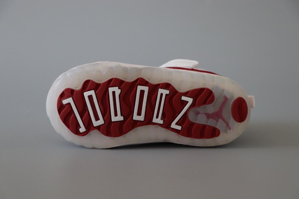 Joe 11 chaussures montantes blanches et rouges