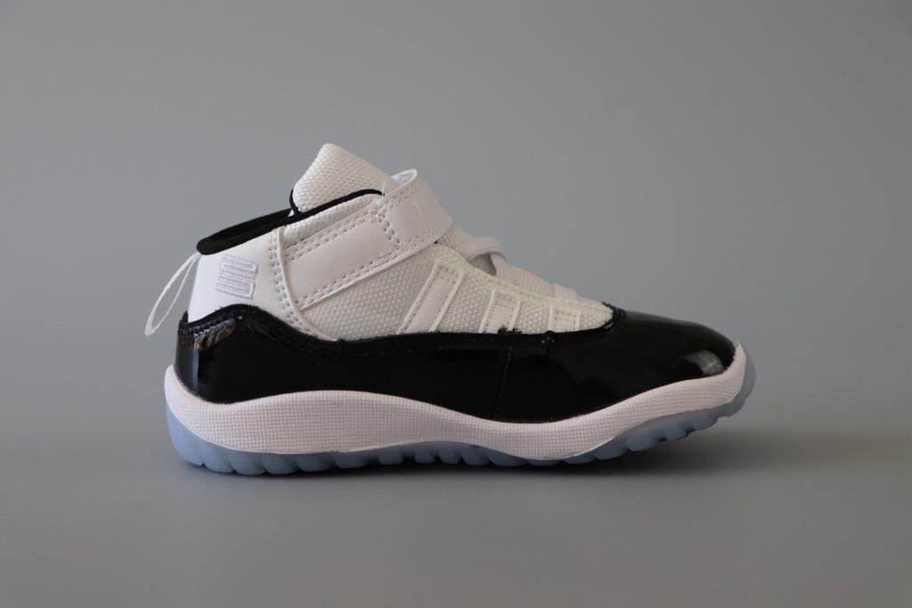 Joe 11 chaussures montantes blanches et noires