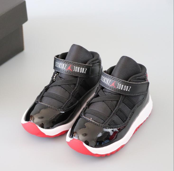 Joe 11 chaussures montantes noires et rouges